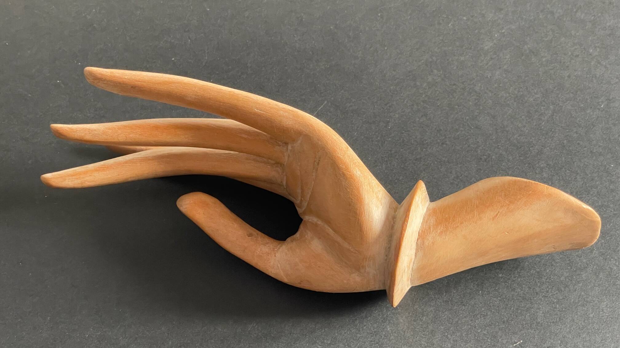 Wooden hand sculpture