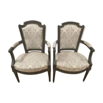 Pair of Louis XVI convertible armchairs