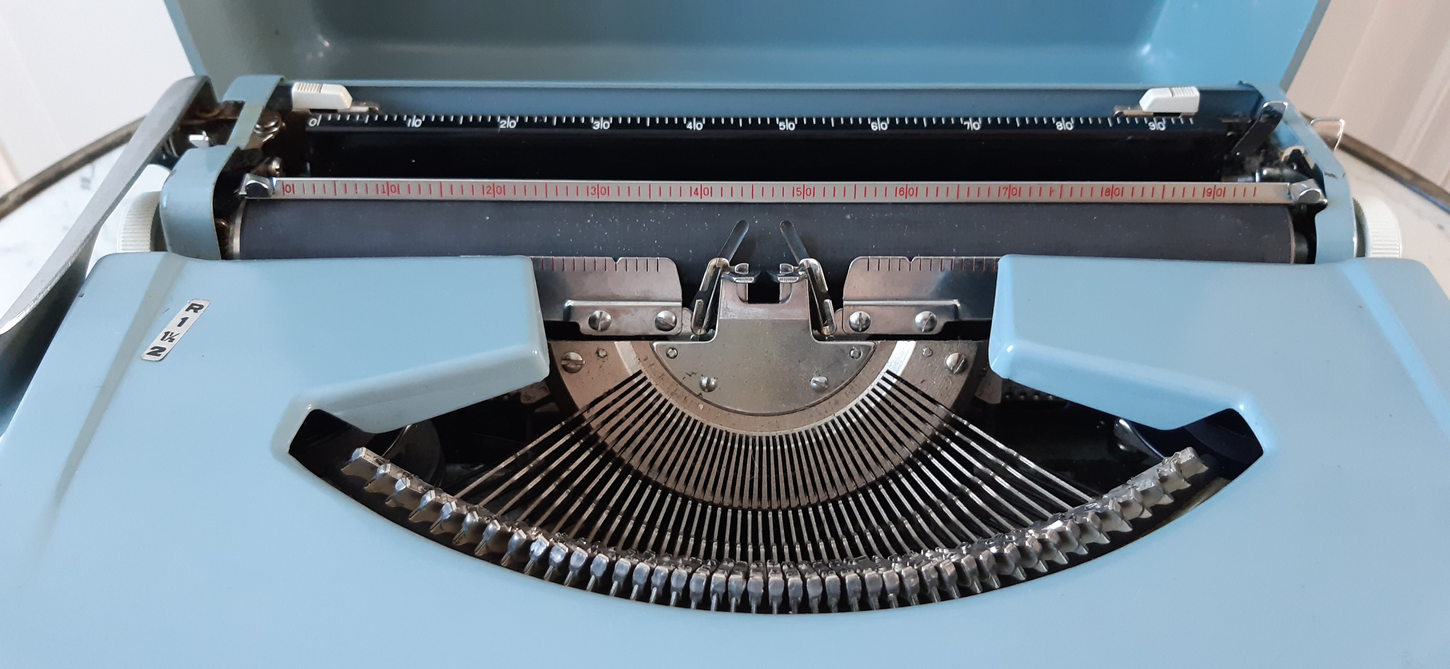 Aqua blue typewriter Brother industries 60s