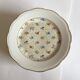 Service de 12 assiettes à dessert en porcelaine S.F.P. Société Française de Porcelaine