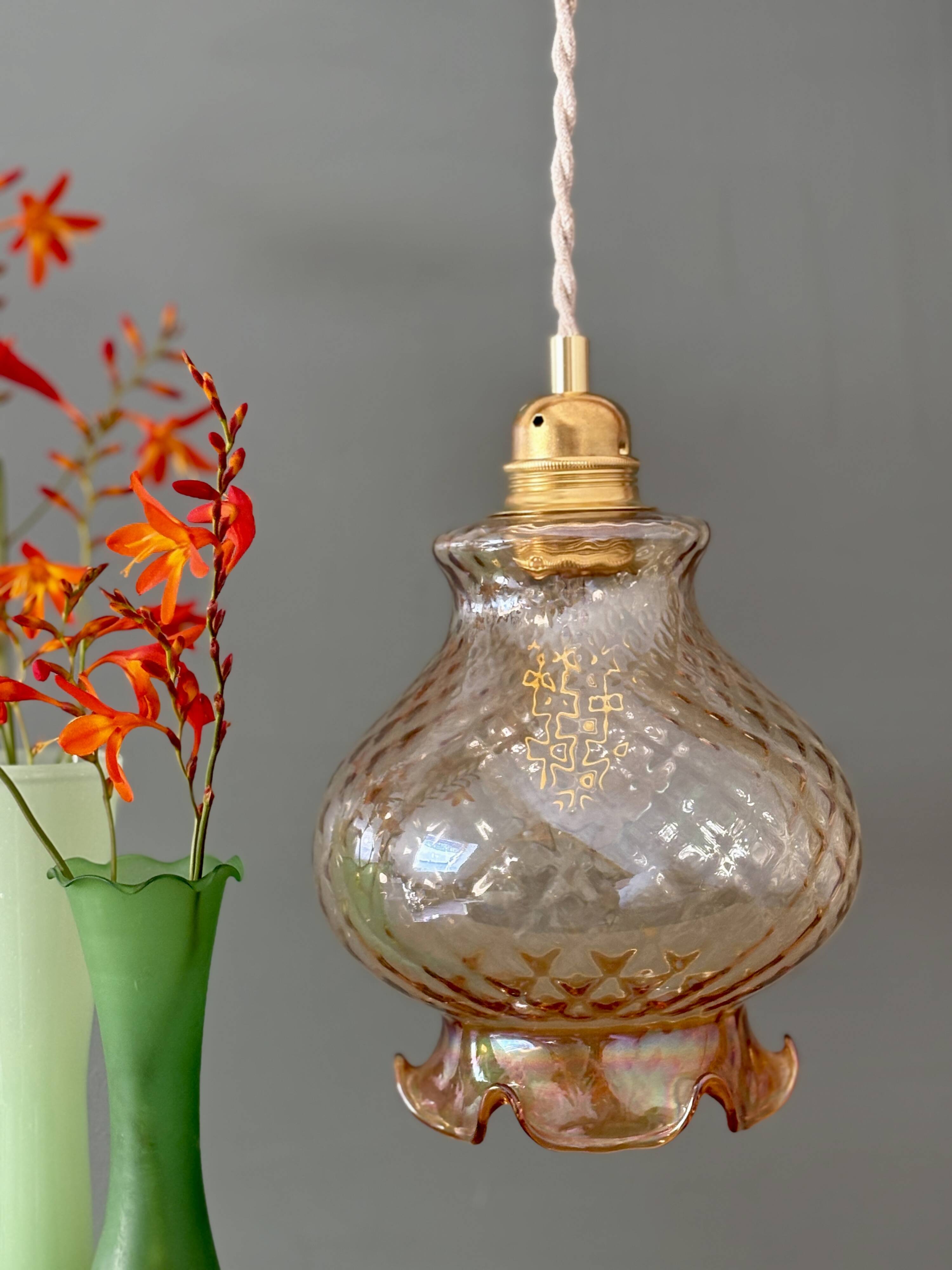 Vintage amber glass suspension globe