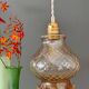 Vintage amber glass suspension globe
