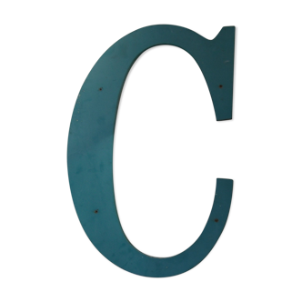 Old wooden sign letter c
