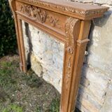 Old English style wooden fireplace
