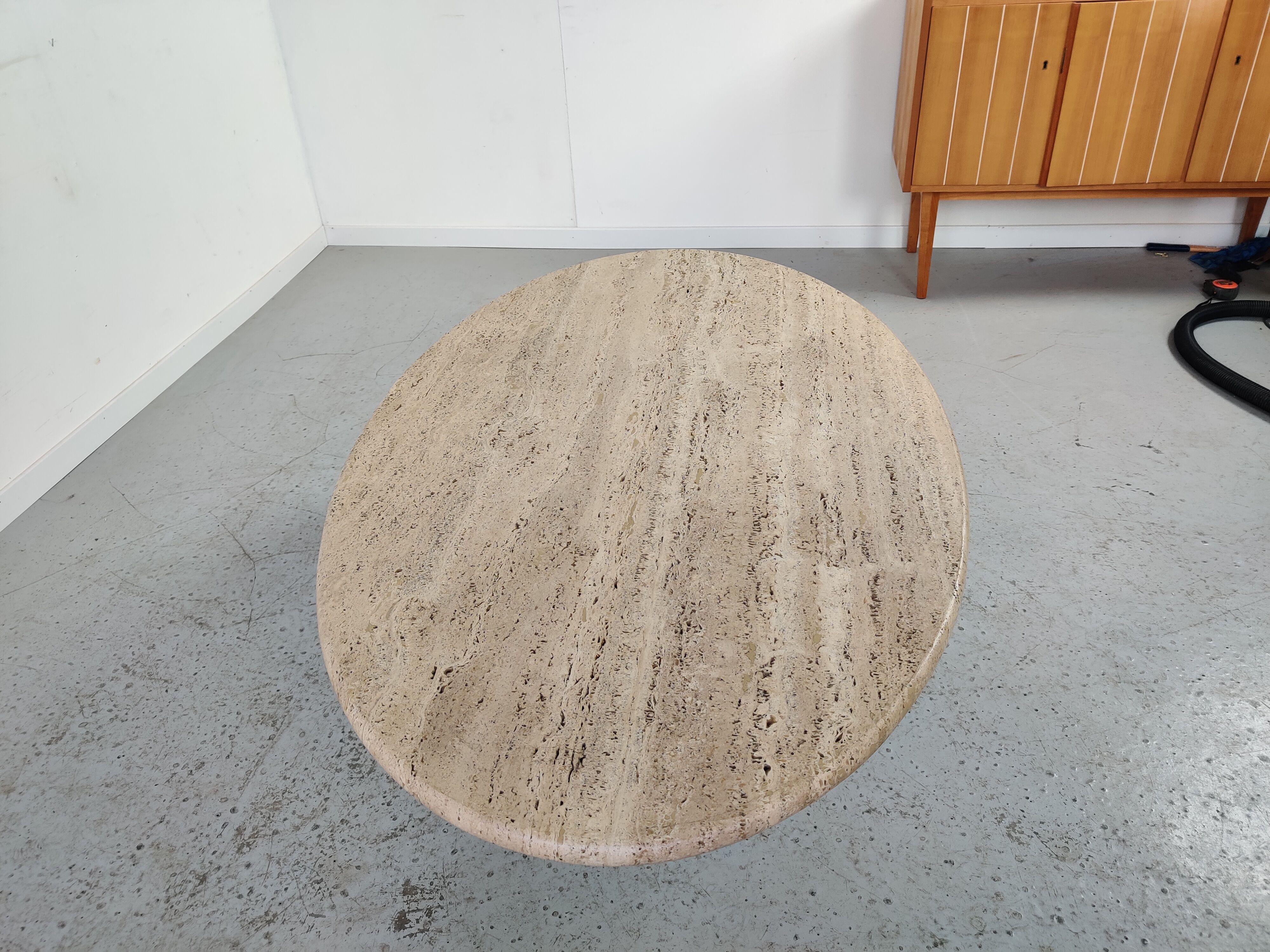 Oval travertine coffee table by Peter Draenert, 80s