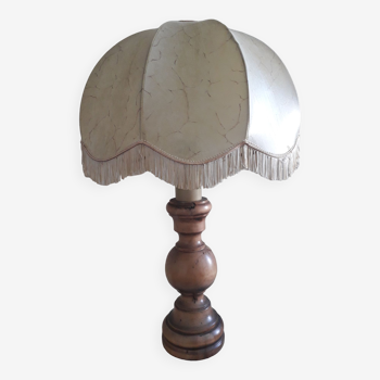 Turned wood table lamp with “skin” shade