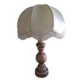 Turned wood table lamp with “skin” shade
