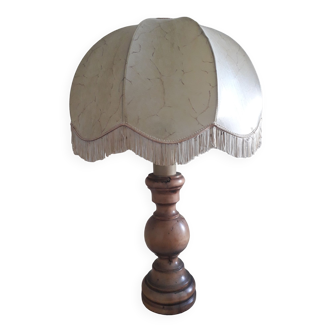 Turned wood table lamp with “skin” shade