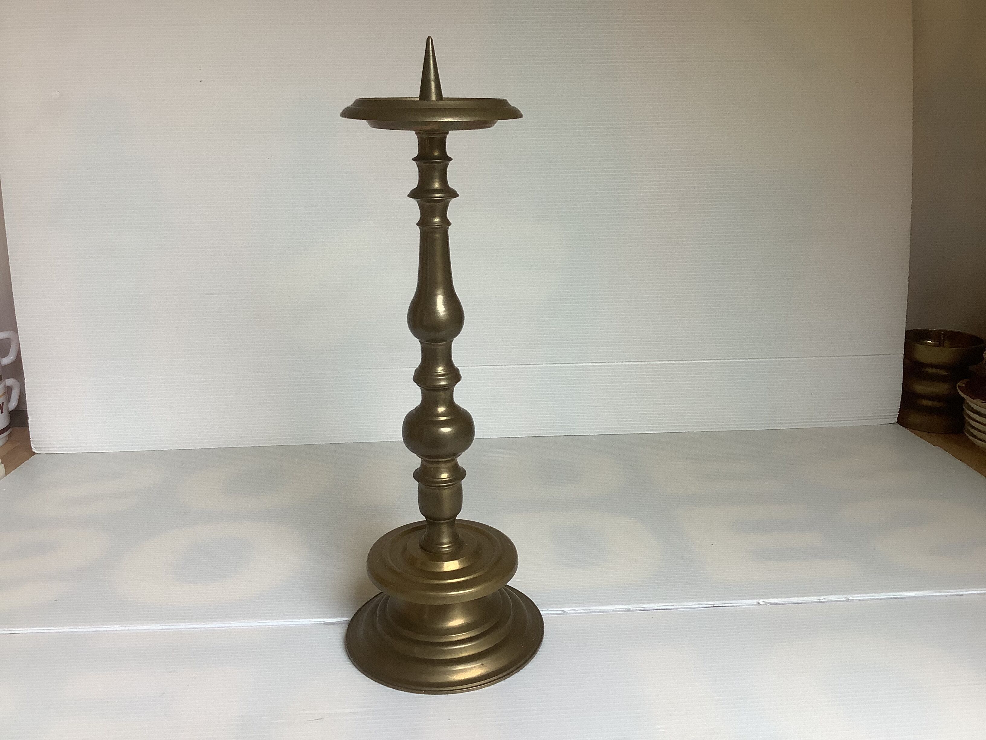 Bronze candle pique