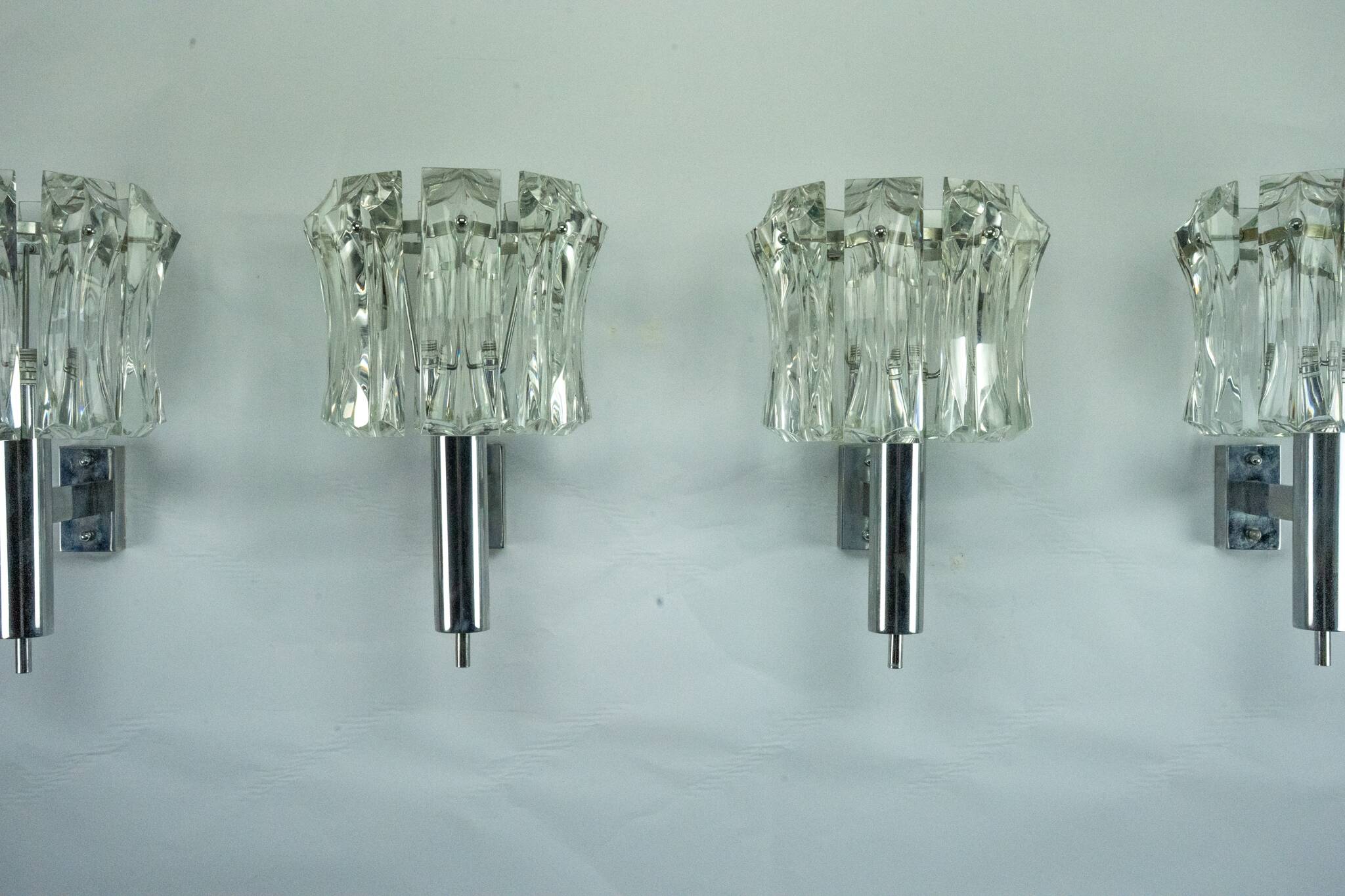 Set of four large Murano glass elements and chromed brass sconces, Italy 60