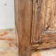 Rustic and vintage wardrobe in raw wood, wabi-sabi style.