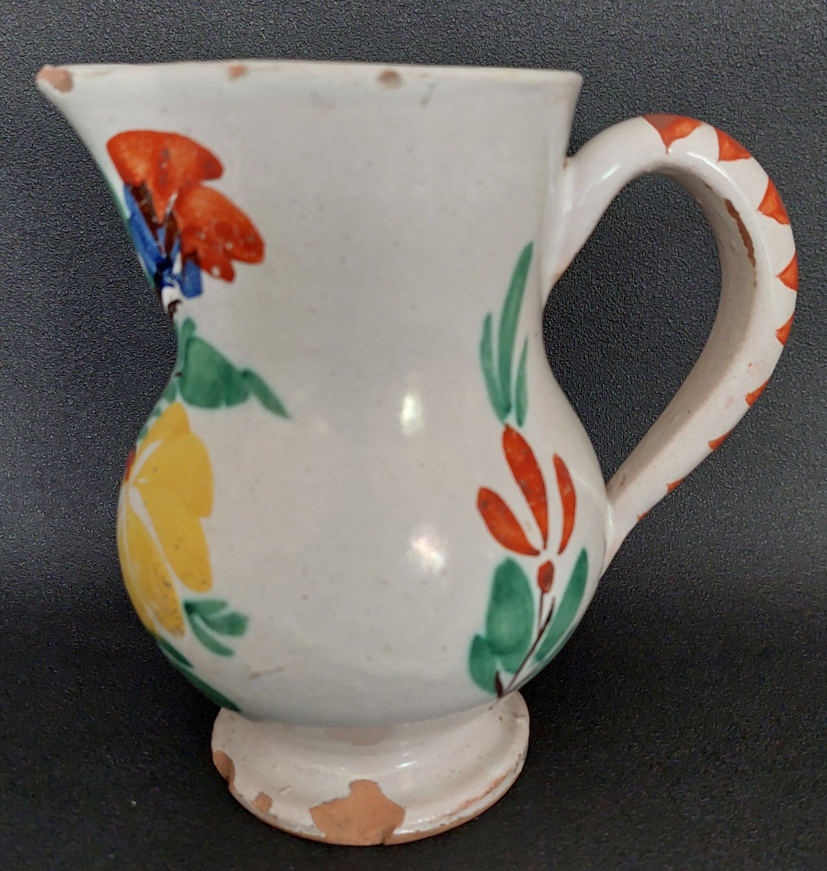 Earthenware pitcher from the late 19th century.