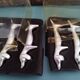 Silver metal knife holders with Dachshund dogs