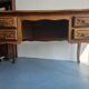 Antique wooden desk with 4 drawers.
