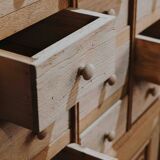 Solid oak dressmaker's cabinet with 13 drawers and 1 door