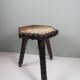 Vintage Spanish stool in carved wood with a leather seat.