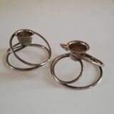 Pair of white metal candle holders