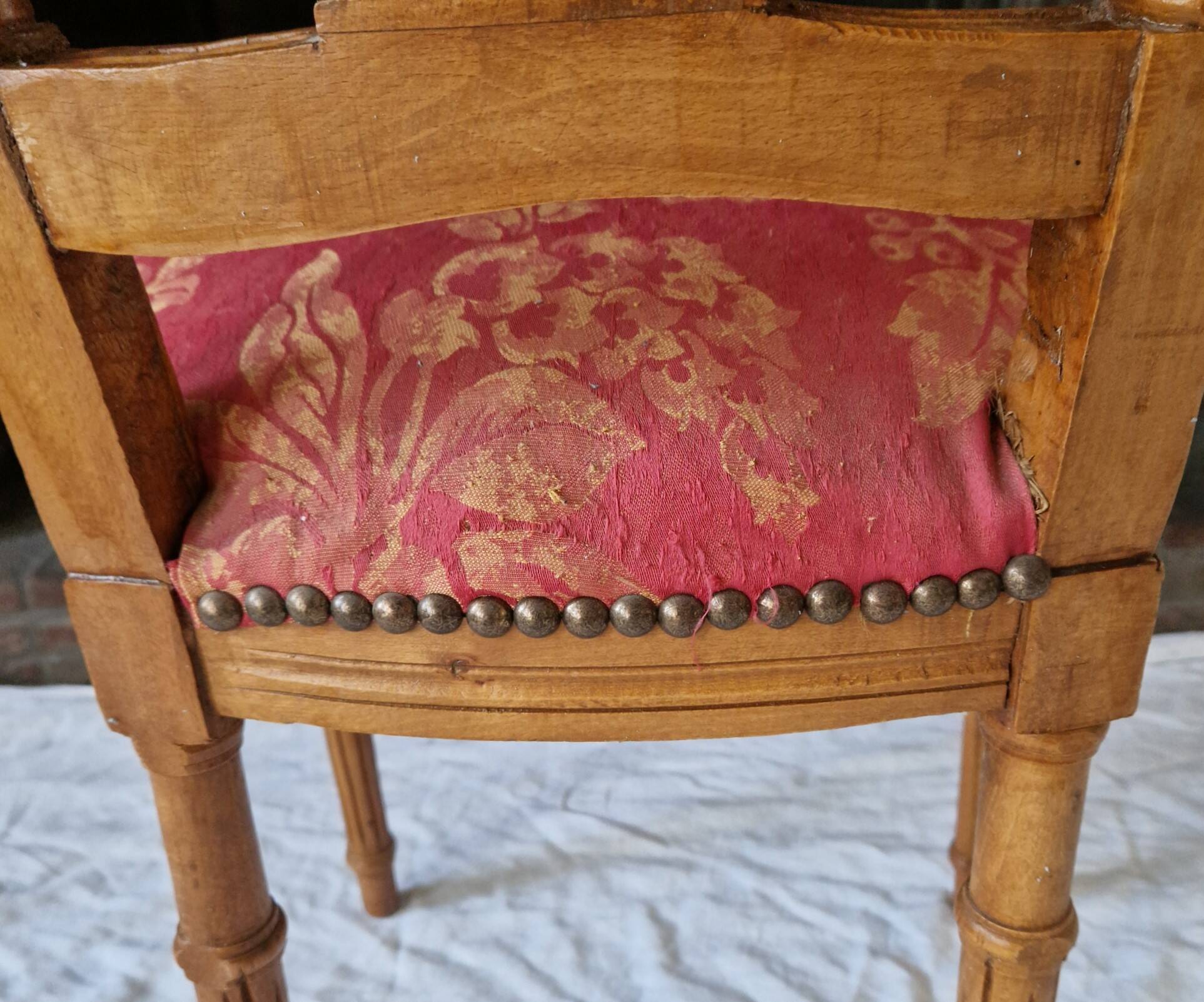 Lyre back chair in carved wood, Louis XVI style, late 19th century.
