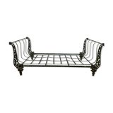 Cast iron bed with floral decorations