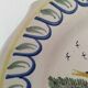 Antique hand-painted earthenware plate – piper and birds