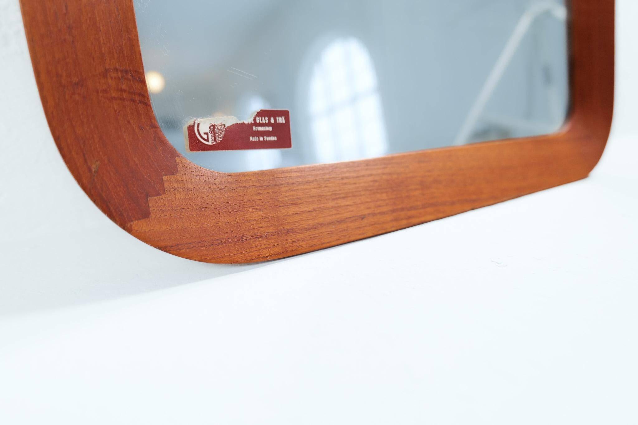 Mid-century modern sculptural wall mirror, teak, crystal glass, Glas & Trä, 1960s