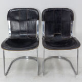 Pair of windmill leather chairs