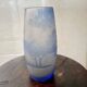 Transparent vase with a blue pattern featuring trees, signed MICHNA.