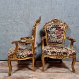 Pair of Louis XV style Baroque armchairs in gilded and carved wood circa 1900