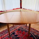 Expandable teak dining table, butterfly extension, circa 60s