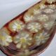 Enamelled terracotta dish decorated with vintage flowers, 40 cm