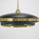 1960s black and gold UFO pendant , Czechoslovakia