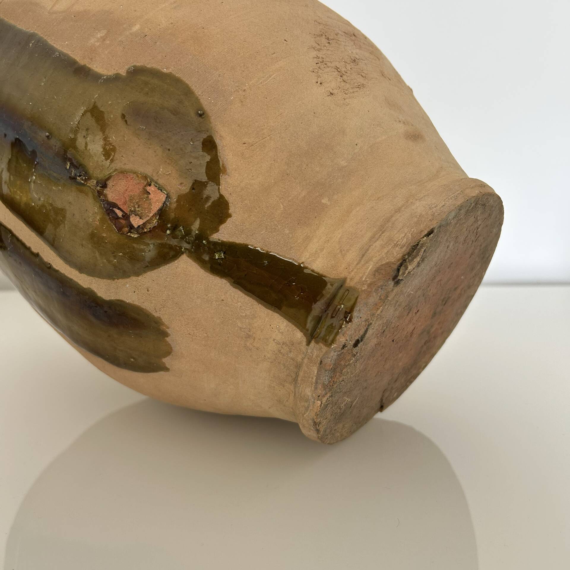 Old jar with brushstroke decoration