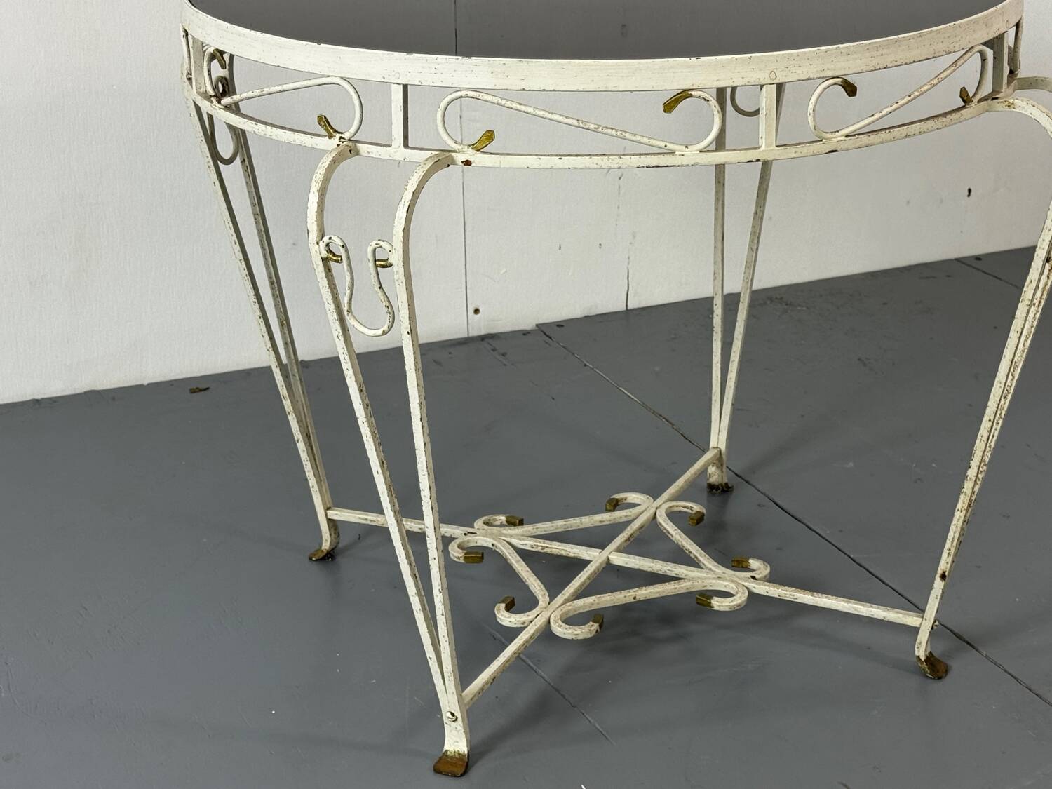 Side table in iron and glass in French Regency style, 1950s.