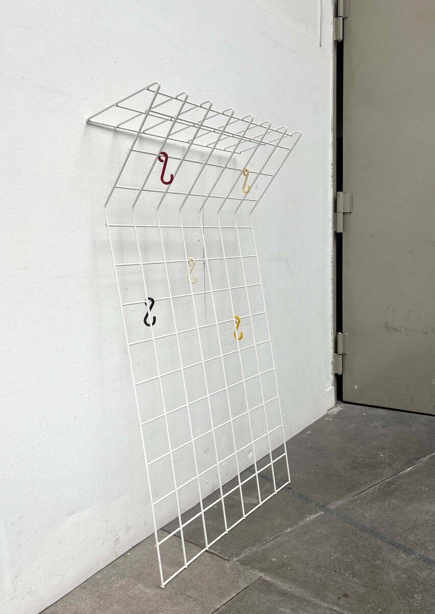 Minimalist white German mid-century coat rack with strings from the 1960s.