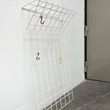 Minimalist white German mid-century coat rack with strings from the 1960s.