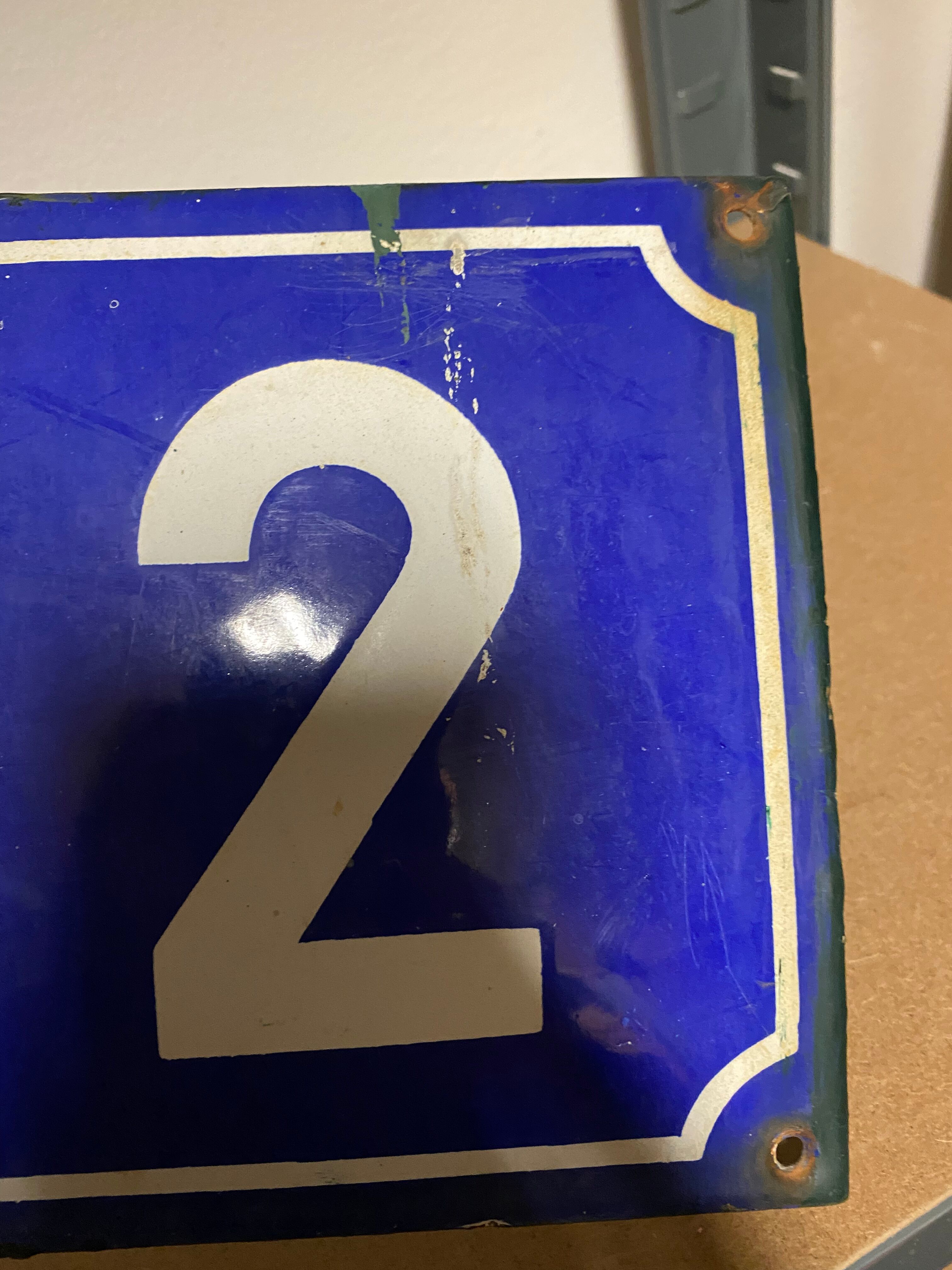 Old enamelled plaque number 12