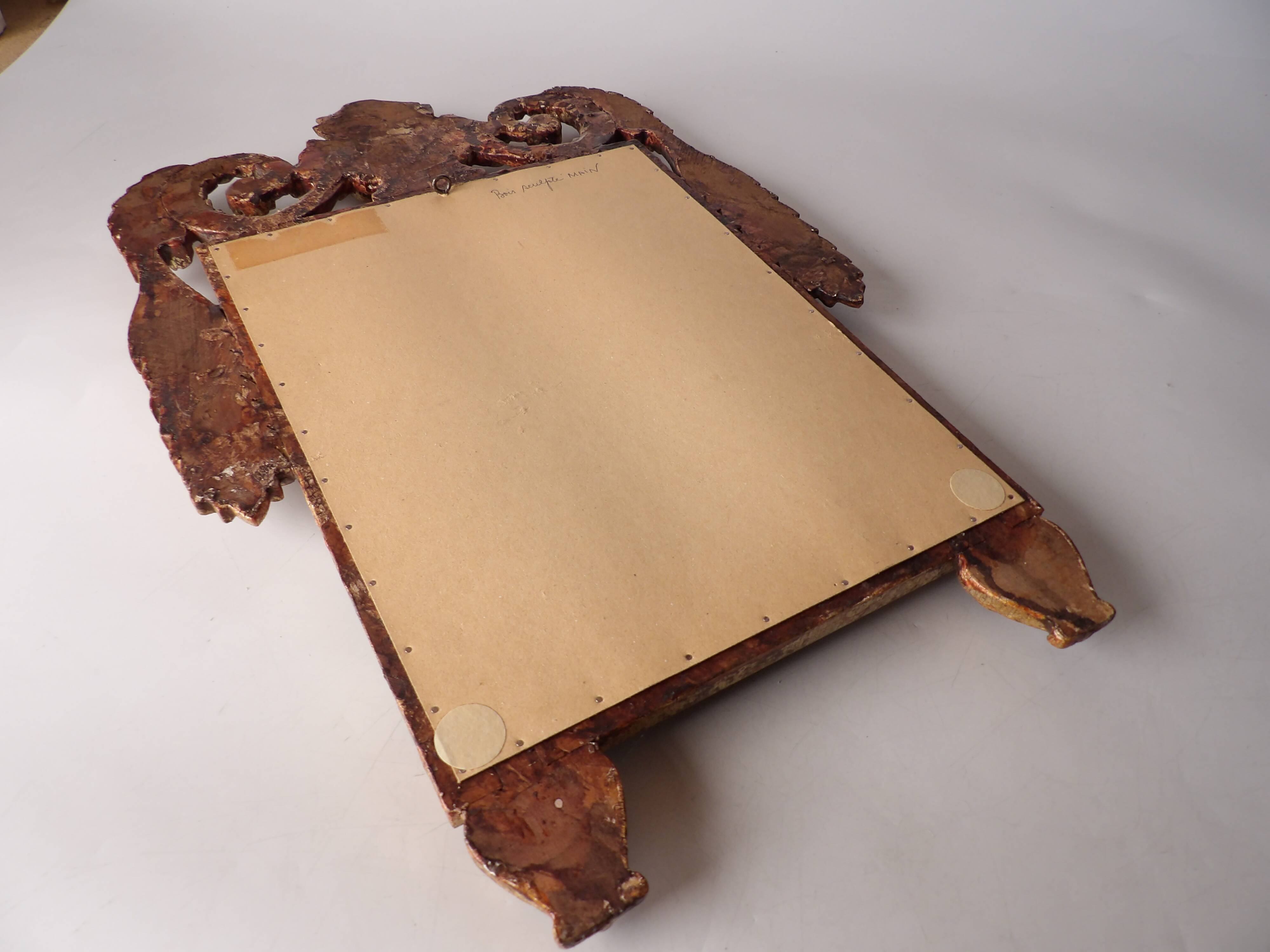 Hand carved wooden mirror