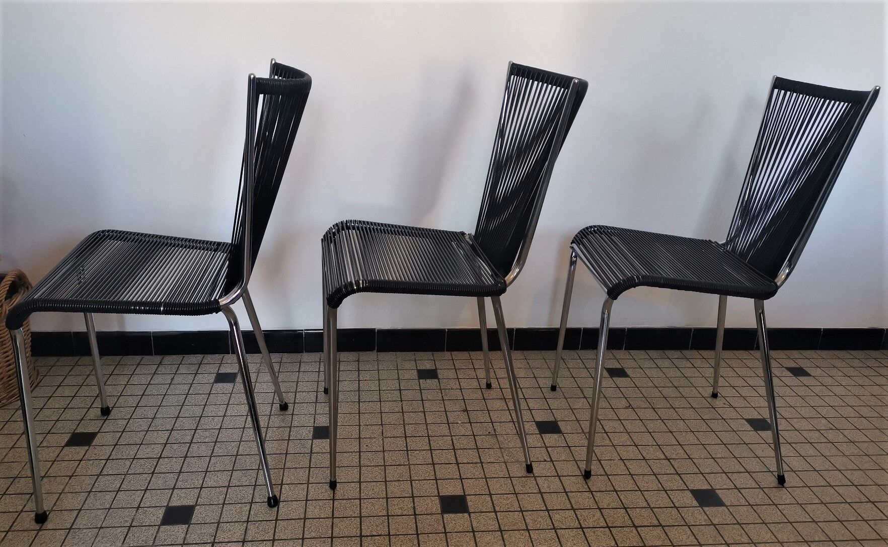 Set of black scoubidou chairs