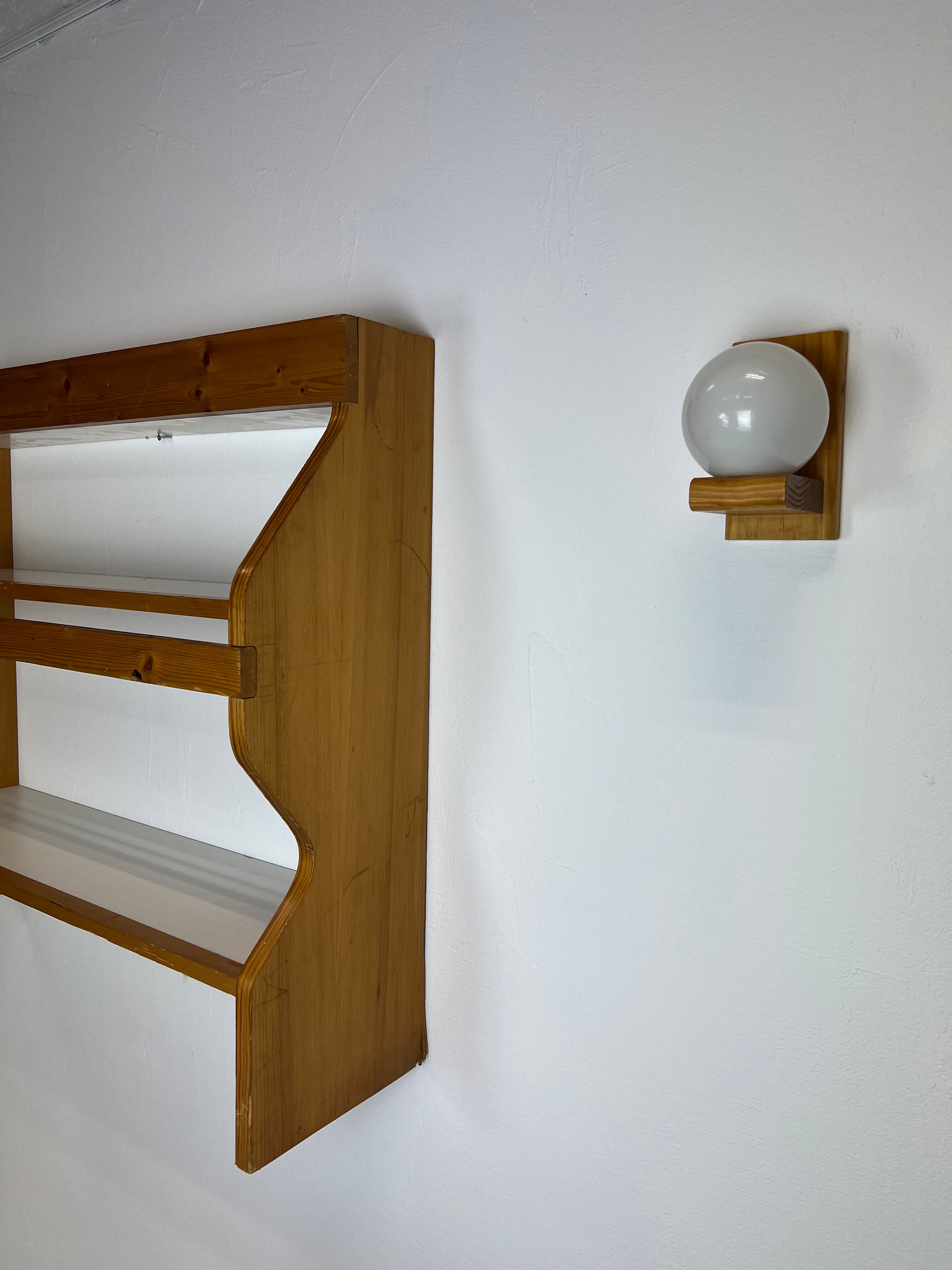 Duo of shelves by Charlotte Perriand