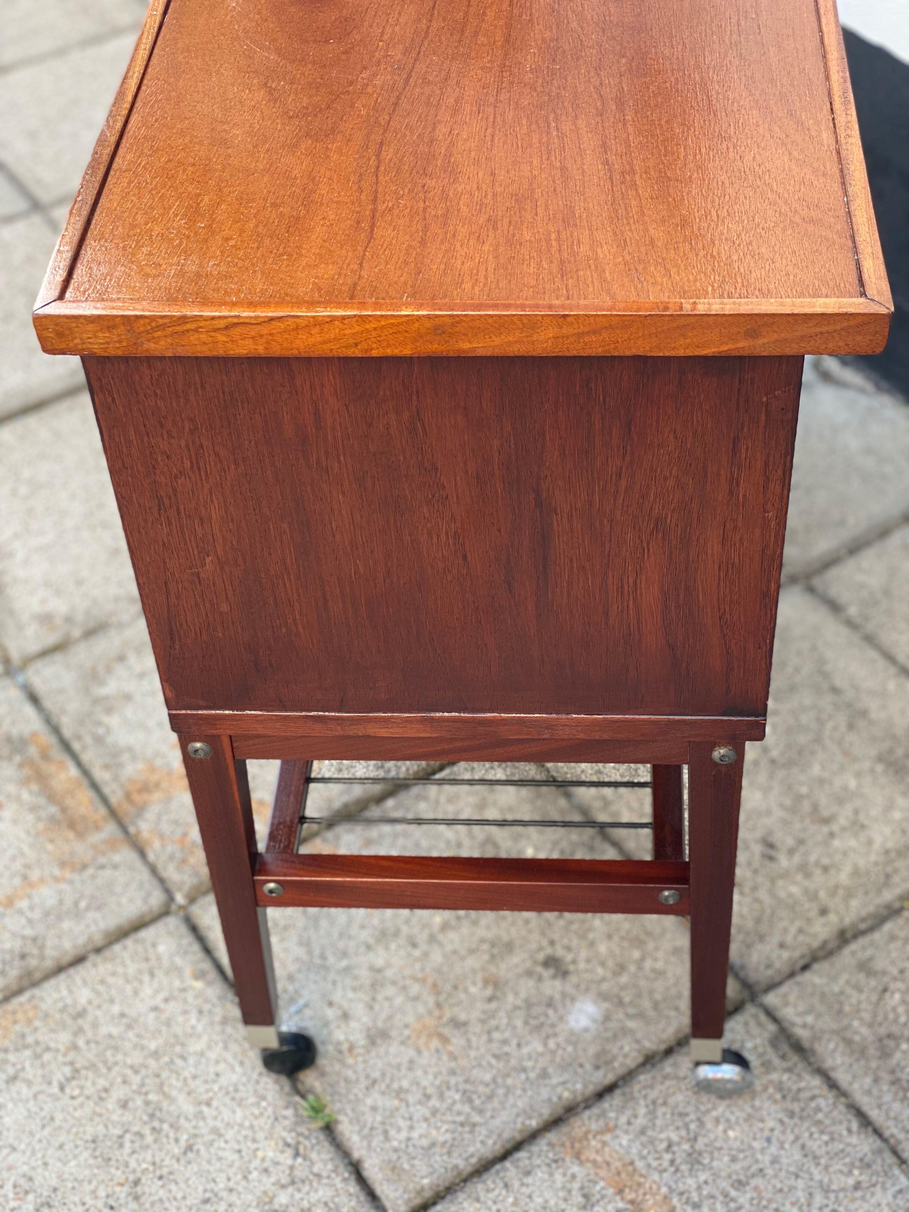 Vintage teak side table with metal magazine rack