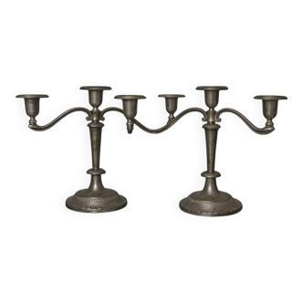 Pair of three-light candlesticks in silver-plated metal