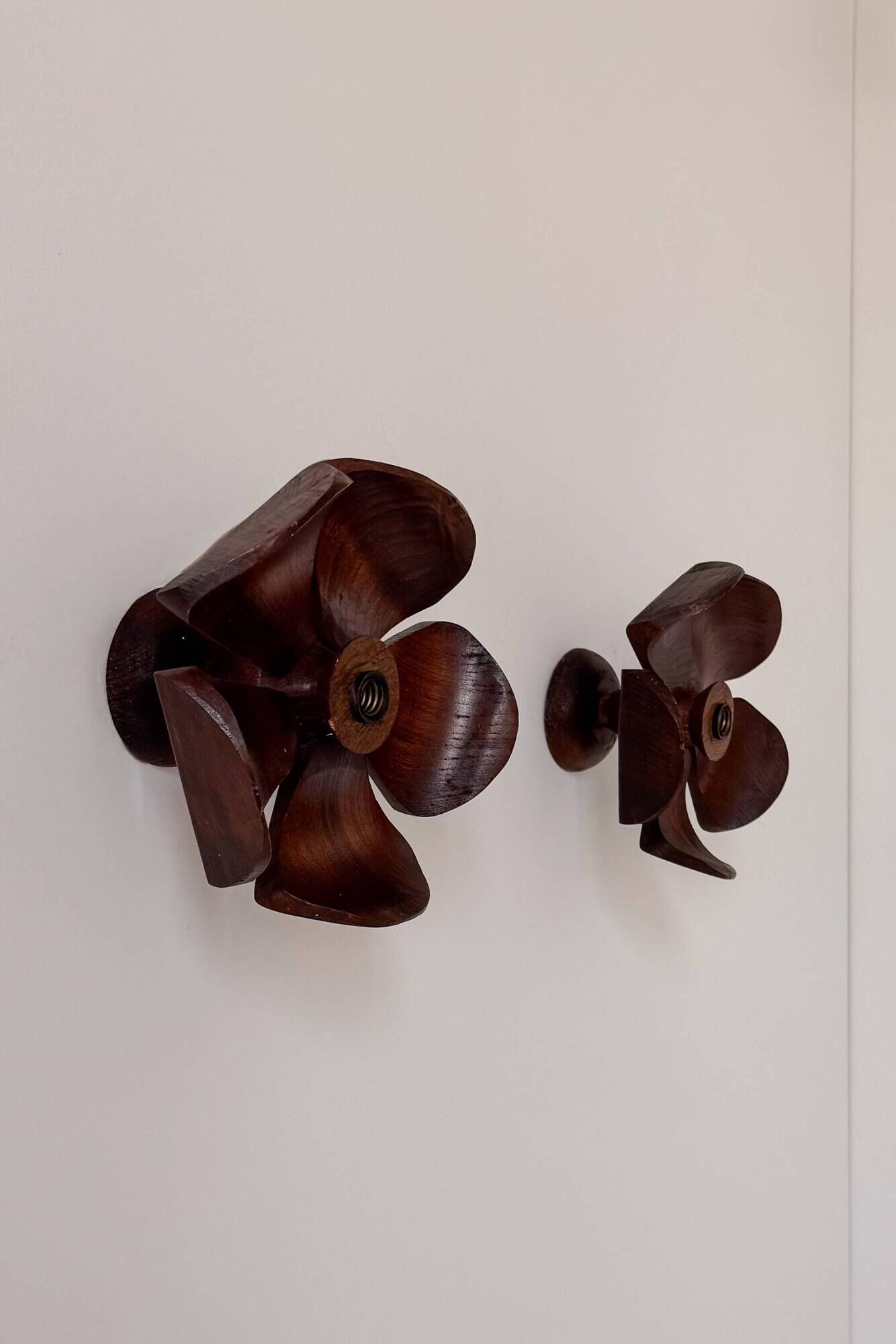 Vintage wall sconces, carved wood with floral pattern, France, 1960.