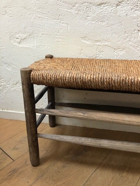 Wooden and straw bench