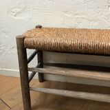 Wooden and straw bench