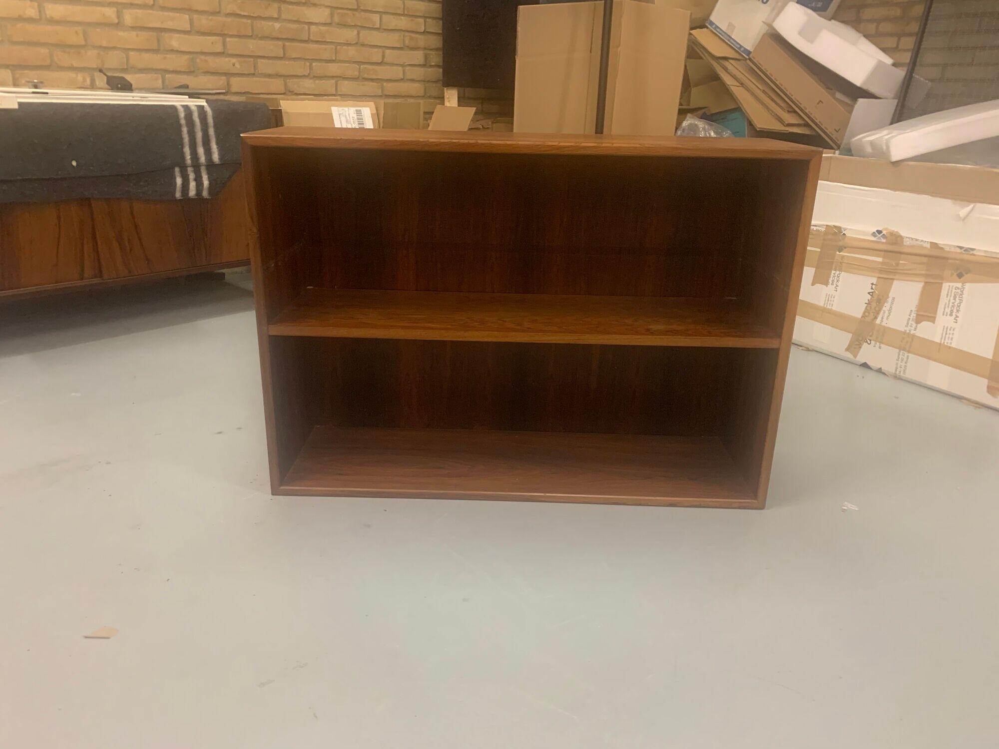 Rosewood bookcase with metal black legs, made in Denmark, 1960s