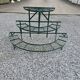Old half-moon wrought iron plant holder