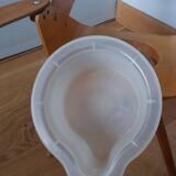 Baumann Baby Coquille children's armchair in bent wood with splayed legs.