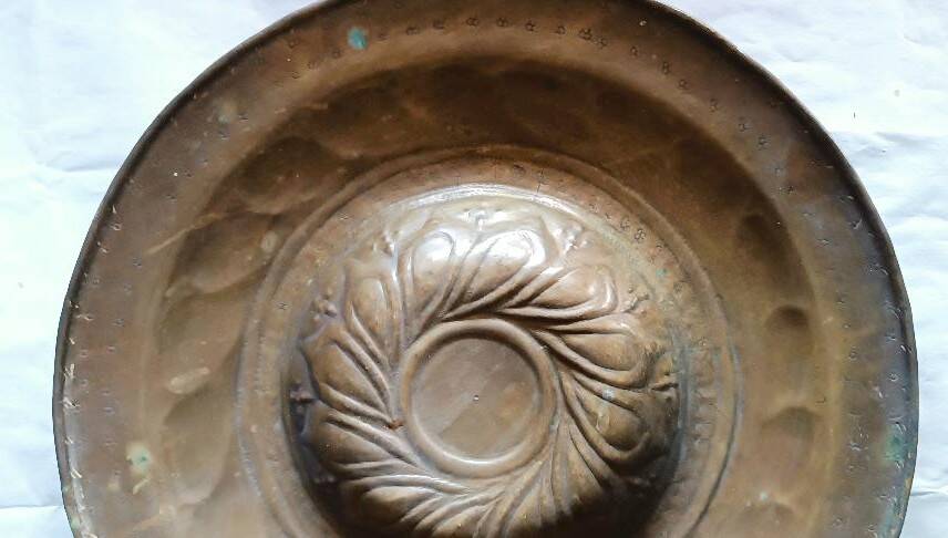 Antique brass alms dish, 17th century