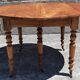 Extendable round table (with extensions and flaps), cherry wood.