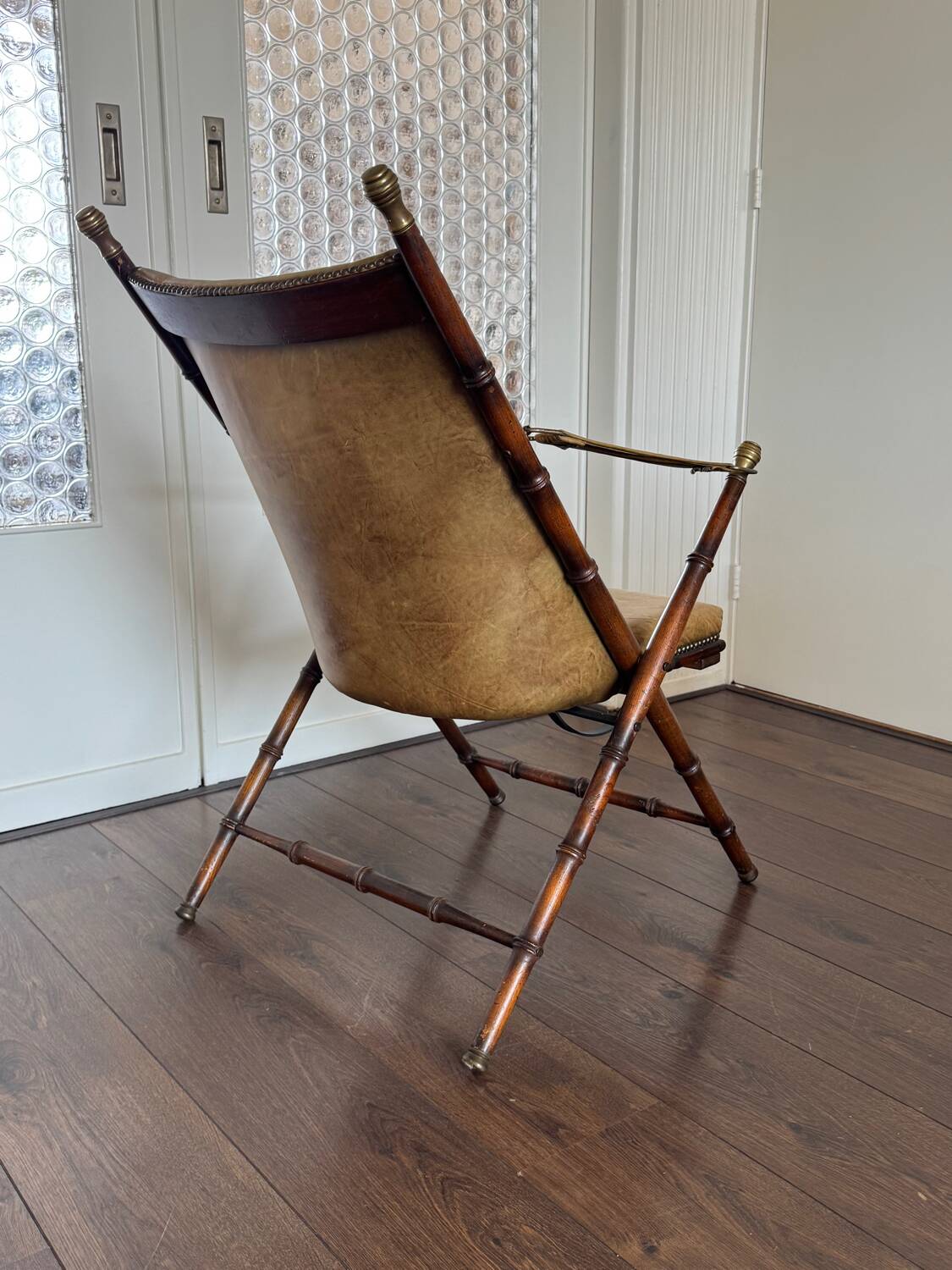 Vintage Faux bamboo, leather campaign folding chair by Maison Jansen, 1950s